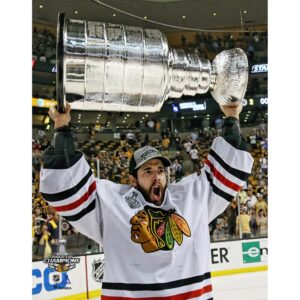 Corey Crawford Chicago Blackhawks Unsigned 2013 Stanley Cup Champions Raising Cup Photograph